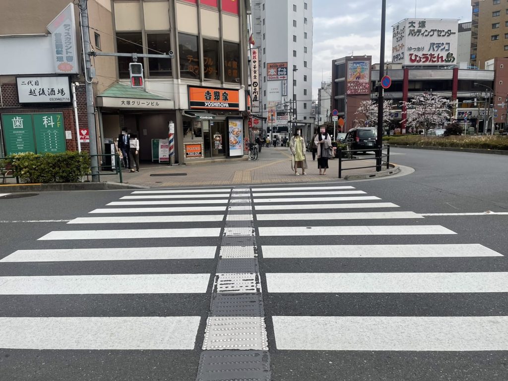 Pedestrian crossing in front of Yoshinoya
