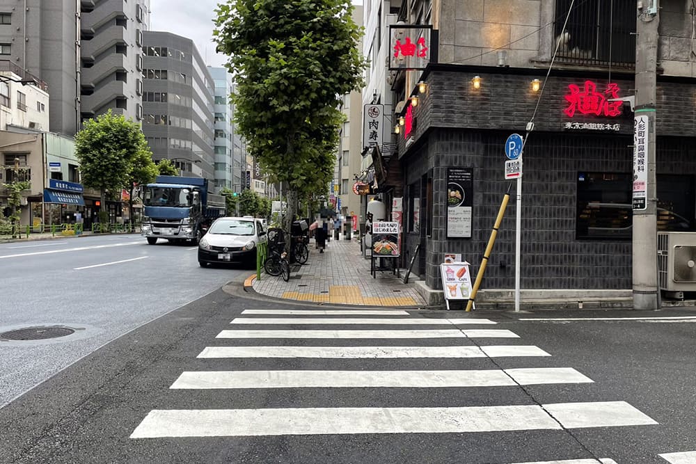 Pedestrian crossing in front of Abura soba