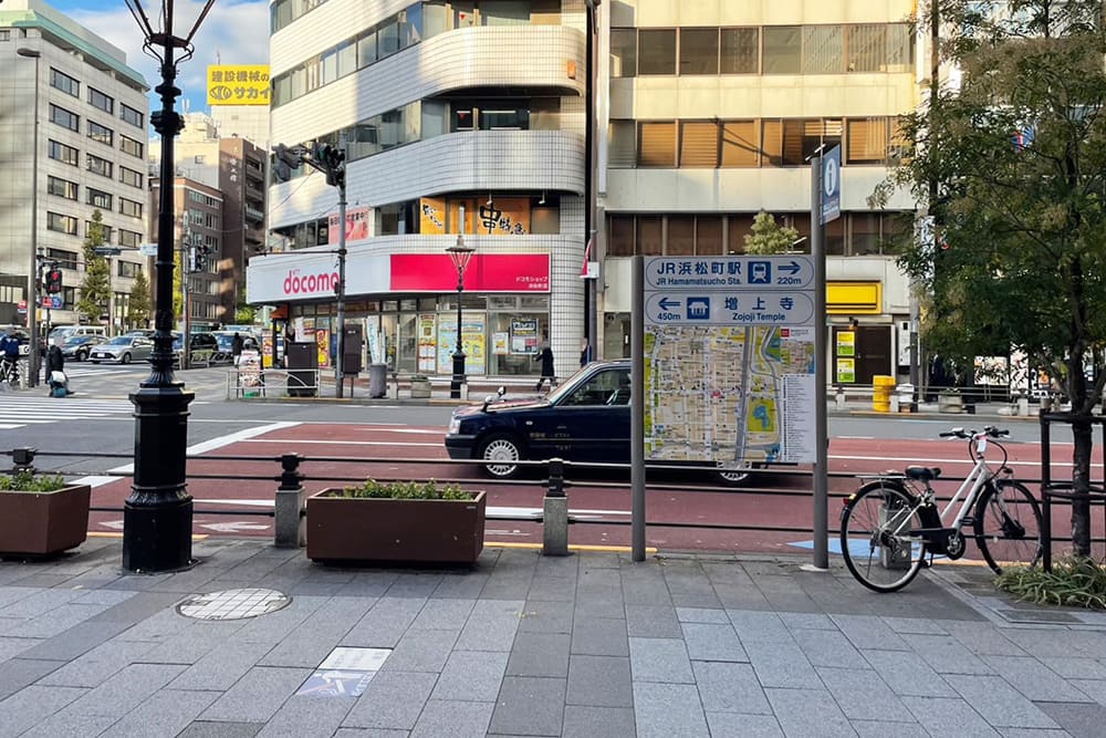 On the ground, coming out of Exit A1 of Daimon Station